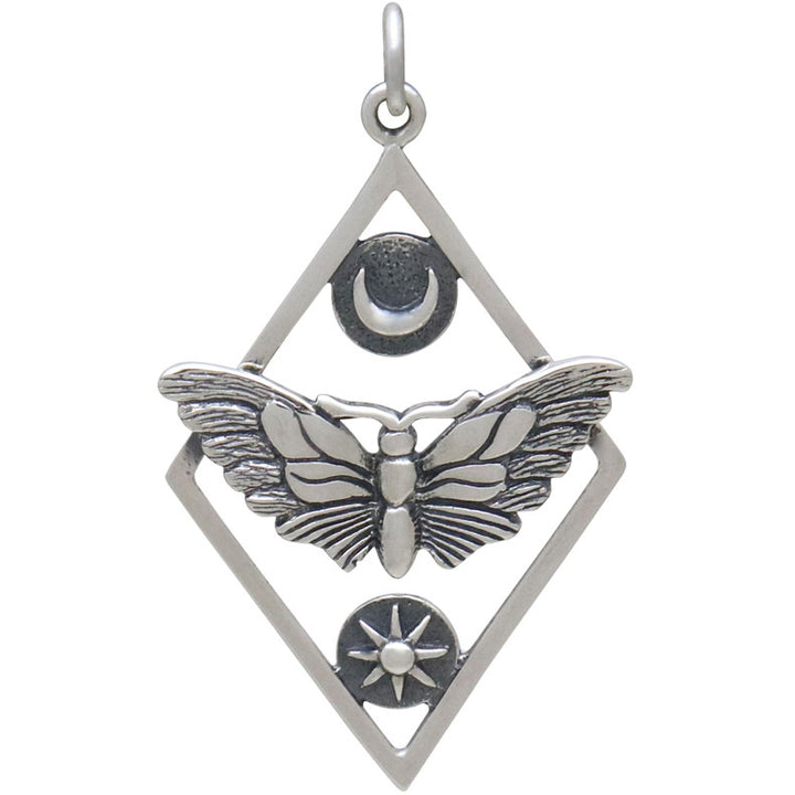 Presenting the Silver Geometric Moth Charm with Sun and Moon by Nina Designs: This unique silver pendant features a beautifully detailed moth with outstretched wings, elegantly set within a diamond-shaped frame. Above the moth is a crescent moon symbolizing psychic awareness, and below it is a sun with rays extending outward. The charm includes a loop at the top for easy attachment to any chain.