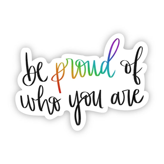 The "Proud of who you are Sticker" by Big Moods showcases the phrase in stylish cursive, with "Proud" highlighted in vibrant rainbow colors, while the remainder is rendered in sleek black on a crisp white background. This durable and weatherproof sticker is ideal for expressing your pride wherever you choose.