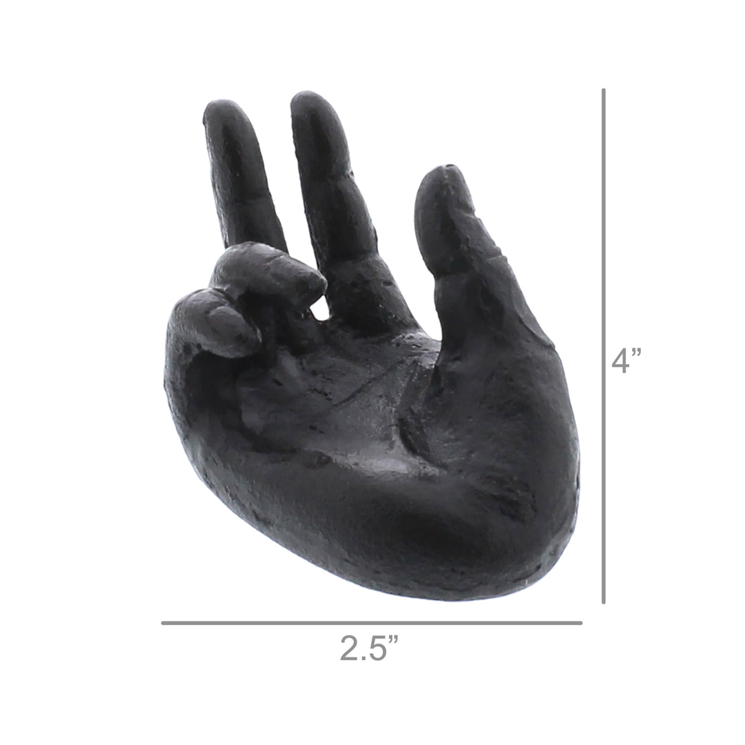 This durable, compact sculpture by HomArt, known as the Single Hand Card Holder in Antique Black, is crafted from cast iron. It features a flat base measuring 2.5 inches wide and stands 4 inches tall. The curled fingers create a peaceful and zen-like gesture with its upturned palm.