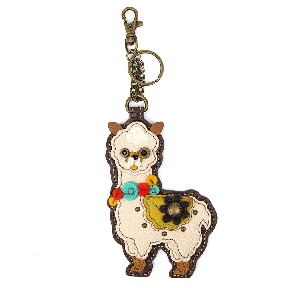 The Chala Llama Keychain showcases an adorable patchwork design with colorful felt flowers. It includes a sturdy metal clip and ring, adorned with antique brass hardware to add a vintage feel, making it an ideal accessory for brightening up your keys!