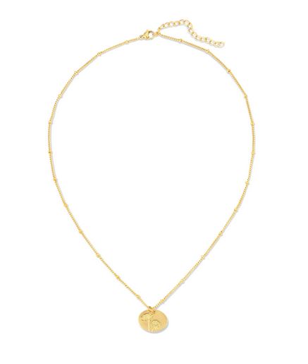 A delicate gold necklace from LuckyFeather featuring a thin 14k gold-dipped chain with small links. The Birth Flower November Mum necklace has an adjustable clasp and is adorned with a circular pendant that boasts an engraved design.