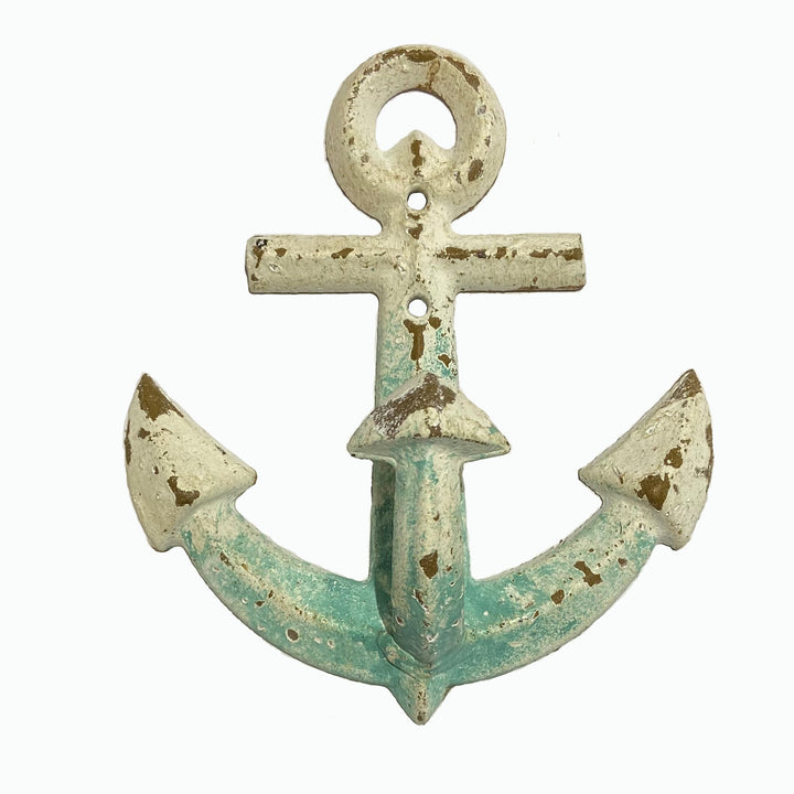 The 180Degrees Cast Iron Anchor Wall Hook is a rustic antique piece boasting a weathered white and teal finish. It stands 6 inches tall and includes a round hole at the top for simple hanging, with two arrow-shaped ends pointing upward to enhance the charm of any space.