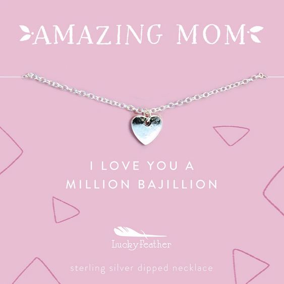 A beautifully displayed nickel-free sterling silver dipped necklace with an adjustable heart charm sits against a pink background. The text reads "AMAZING MOM" and "I LOVE YOU A MILLION BAJILLION," with the brand name "LuckyFeather" featured underneath.