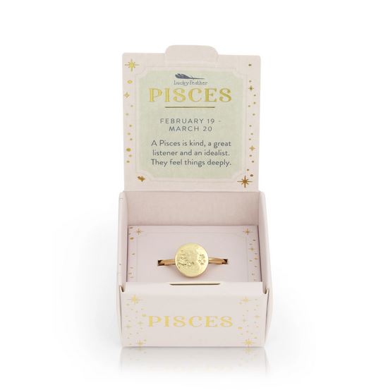 The Pisces Signet Ring by LuckyFeather presents a beautiful textured gold design with the Pisces symbol elegantly displayed inside an open box. The engraved signet highlights the Pisces birth dates, February 19 - March 20, alongside traits such as "A Pisces is kind, a great listener and an idealist." Its adjustable band guarantees a perfect fit.